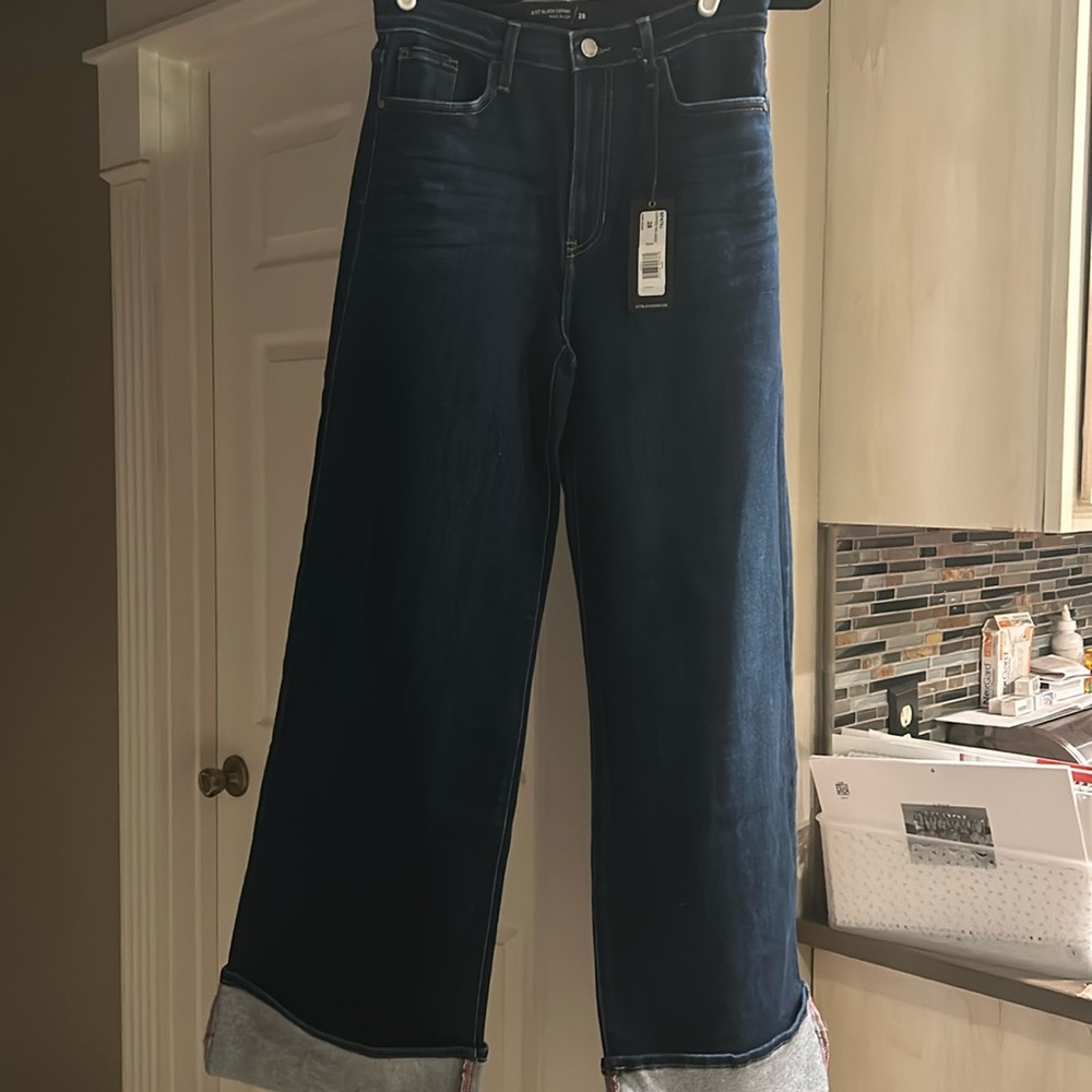 Brand new cuffed palazzo jeans. size 28. 31 inch inseam. High rise.